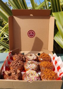 A box of Madisons doughnuts
